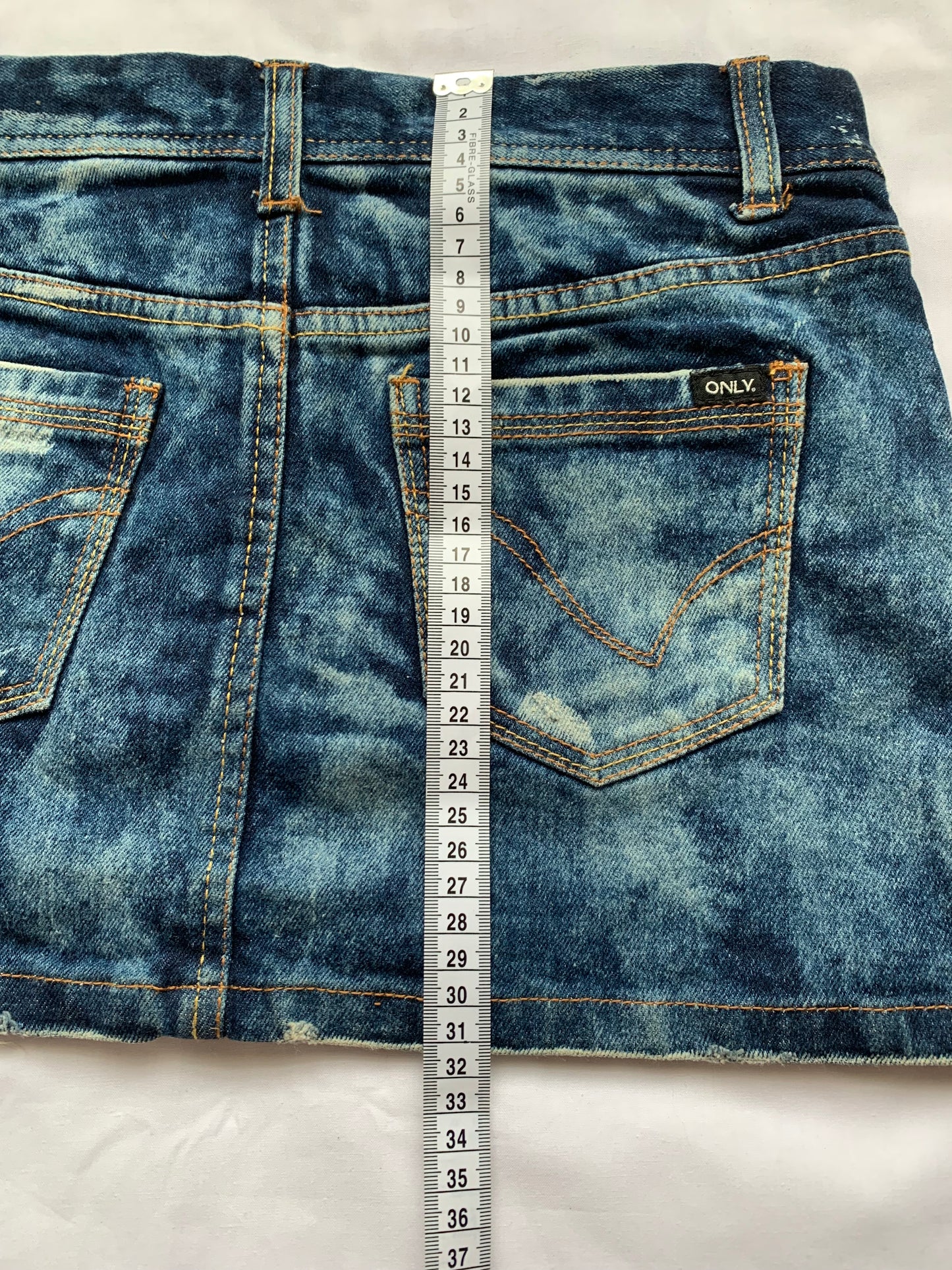 Only jeans denim mini skirt measurements in photo