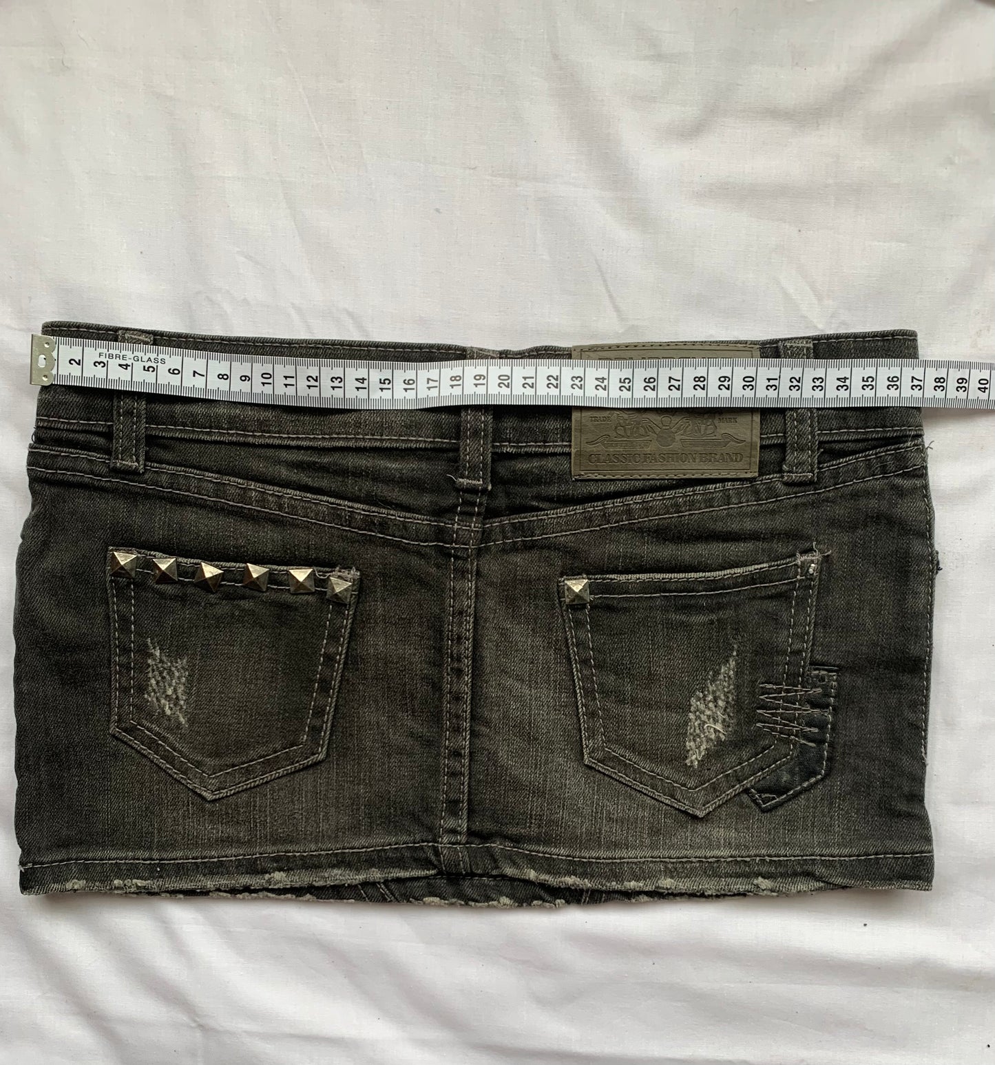 Black denim mini skirt